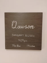 Load image into Gallery viewer, This 12x12 inch wood sign is customized with your child’s name written in white calligraphy, birth date, time, weight, and length in grey stain colour.