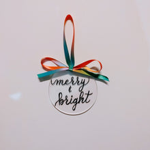 Load image into Gallery viewer, Each clear acrylic ornament is a flat 4 inch round that can be personalized with a name or small phrase. This classic style comes in your choice of ribbon and font colour. If you would like your ornament to also have the background painted please let me know the colour below. 4 inch round, 4mm thickness.