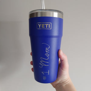 Blue yeti drinkware engraved with #1 Mom in calligraphy