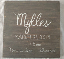 Load image into Gallery viewer, This 12x12 inch wood sign is customized with your child’s name written in white calligraphy, birth date, time, weight, and length in grey stain colour.