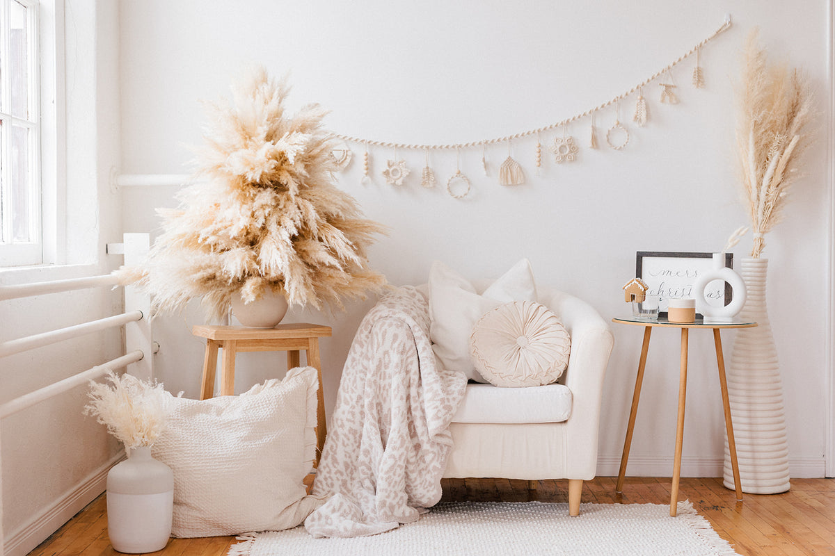 Relaxing space for lounging in neutral decor with a wood calligraphy sign.