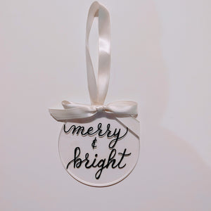 Each clear acrylic ornament is a flat 4 inch round that can be personalized with a name or small phrase.  This classic style comes in your choice of ribbon and font colour. If you would like your ornament to also have the background painted please let me know the colour below.   4 inch round, 4mm thickness.