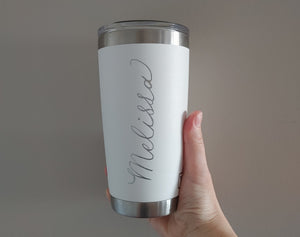 White yeti drinkware engraved "Melissa" in Calligraphy
