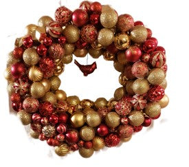 Handmade Christmas Wreath with Red and Gold Christmas bulbs, the wreath is accented with a cardinal ornament. 