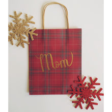 Load image into Gallery viewer, Would you like a personalized kraft bag for a holiday gift for a loved one? Each gift bag can be personalized with a name written in calligraphy with choice of font colour.   Small kraft bag dimensions 5.25 x 8.5 inches (13.3cm x21.5cm)  Medium kraft bag dimensions 8 x 10 inches (20.3 cm x 25.4 cm)
