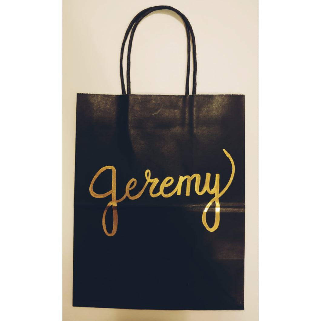 This classic black gift bag can be personalized with the name or saying of your choice.  Each gift bag is written in calligraphy in your choice of font colour.  Medium kraft bag dimensions: 8 x 10 inches (20.3cm x 25.4 cm) 