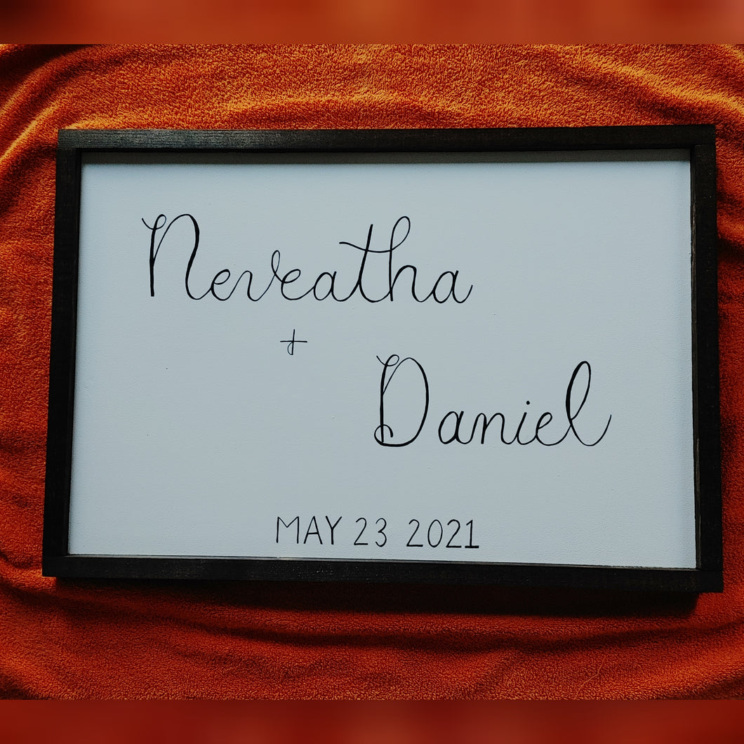 This framed wedding sign is made of solid high quality wood,  and the font is written in calligraphy in black font. The frame is stained in your choice of colour and sealed fully for weather resistance. Are you looking for custom font or sign colour please let me know. 