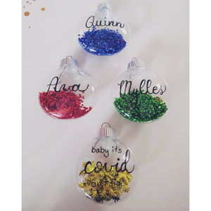 Personalized clear plastic Christmas ornaments in a variety of colours handwritten in black calligraphy font. The perfect handmade gift for someone special in your life.