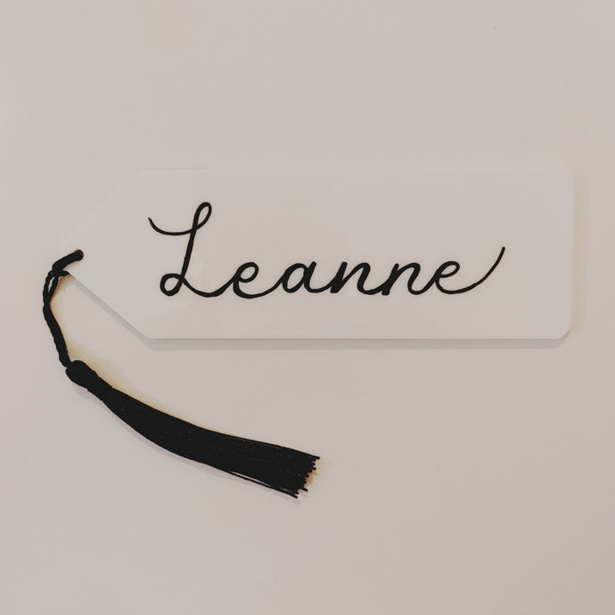 Do you have a book lover in your life and are looking for a thoughtful gift?  Each white acrylic bookmark can be personalized in your choice of font colour and includes a colourful tassel.  If you want extra sparkle can be customized with gold or silver flecks.    2x6 inches, 3mm thick