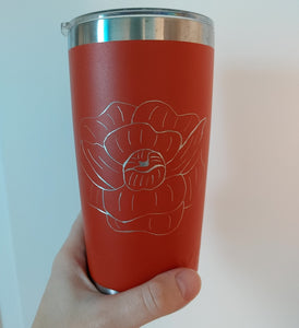 Orange Yeti drinkware engraved with a floral of a Peony