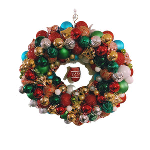 Handmade Christmas Wreath made with Green, Red and Gold bulbs accented with hanging mitten ornament