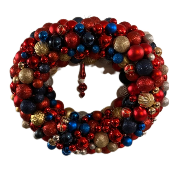 Handmade Christmas Wreath made with Red, Blue and Gold bulbs accented with hanging ornament