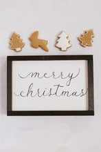 Load image into Gallery viewer, This Merry Christmas framed wood sign is handwritten in flowy calligraphy font with an espresso colored frame. This handmade sign is surrounded by homemade gingerbread cookies 
