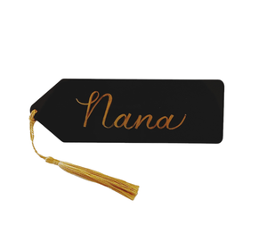 Acrylic black bookmark personalized with gold calligraphy "Nana". Each bookmark comes with a coloured tassel of your choice