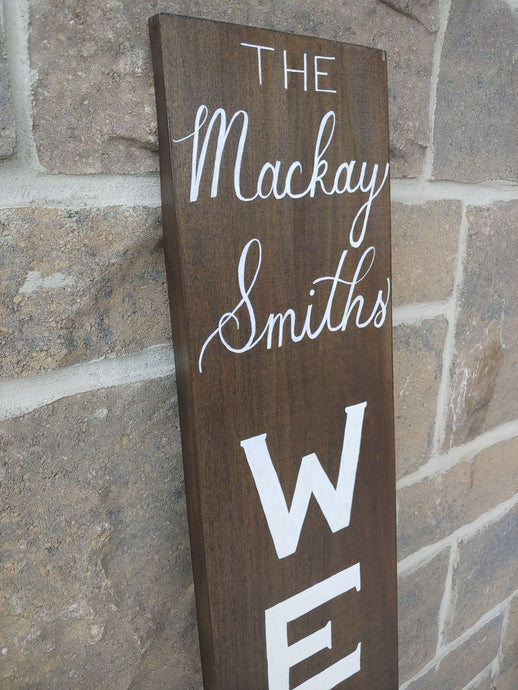 A personalized welcome sign can be a warm, welcoming piece at the entrance of your home with a family name that can be added to the top of the sign.  Each sign is vertically hand lettered with “WELCOME” that is painted white down the center of the sign on a 48x7 inch solid wood sign. Each sign is stained in your choice of colour and sealed for weather resistance. Are you looking for custom font colour please let me know!   Please allow me up to two weeks to produce your Welcome sign.  